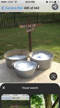 an image of two buckets with water in them and a sign that says, camera rollin hole