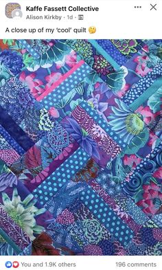 a colorful patchwork quilt with flowers on it