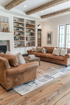 a living room with two couches and a fire place in the middle of it