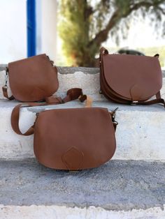 New Brown Saddle bag with adjustable cross body strap. Custom made bag in plenty of colors with adjustable strap. This is the perfect IT bag for this season all across runways and celebrities. Dimensions: SMALL: 20*22 cm MEDIUM: 22*28 cm LARGE: 25*28*10 cm Strap: 125 cm All Bags are made to order. If you like this bag, please see our full collection in the below link: https://www.etsy.com/shop/madammeshushu?section_id=17490770&ref=shopsection_leftnav_3 More on who we are Welcome to my store Brown Saddle Bag, Black Saddle Bag, Cross Body Handbag, Colorful Handbags, Handmade Sandals, Bags Leather Handbags, Handbag Leather, Handbag Women, Black Leather Purse