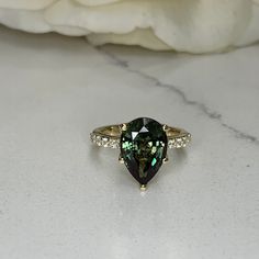 Sleek sellouts! 🤓. Order Green Sapphire Pear Shaped Engagement Ring 14k Gold Ring , Pear Shape Green Sapphire Solitaire Engagement Rings , Green Sapphire Ring #7257 at $625.00 #EngagementRings #EngagementRing #LadiesSapphireRing #PearShaped #PearShape #14kGoldRing #GreenSapphireRing #GreenSapphire #SimplePearRing #SolitaireRing Green Pear-shaped 14k Gold Rings, Yellow Gold Pear-shaped Ring With Accent Stones, 14k Gold Pear Shaped Ring With Prong Setting, Pear-shaped 14k Gold Ring With Prong Setting, Pear-shaped Yellow Gold Rings With Accent Stones, Pear Shaped Yellow Gold Rings With Accent Stones, Fine Jewelry Pear-shaped May Birthstone Ring, Pear-shaped Prong Setting Ring For May Birthstone, Pear-shaped May Birthstone Ring With Prong Setting