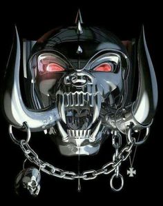 a metal mask with red eyes and chains around it's neck, on a black background