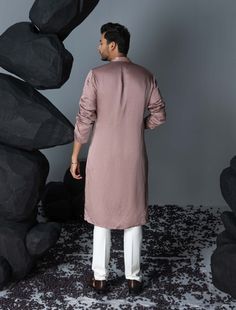 Experience sophistication in a silk linen kurta adorned with leaf motif embroidery and an embellished placket. Paired effortlessly with pants, this ensemble strikes a perfect balance between timeless elegance and modern style. Elegant Linen Kurta With Resham Embroidery, Designer Linen Kurta For Eid, Elegant Straight Kurta With Set-in Sleeves, Elegant Linen Set With Resham Embroidery, Festive Elegant Linen Kurta, Elegant Linen Kurta For Spring, Eid Linen Long Sleeve Sets, Linen Long Sleeve Sets For Eid, Festive Linen Kurta For Eid