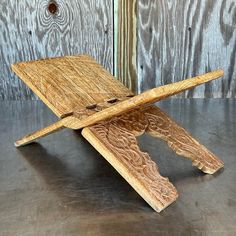 a wooden object sitting on top of a table