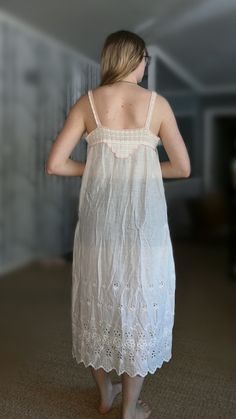 "Gorgeous 1890's white semi sheer cotton nightgown with eyelets at the hem and white and pink crochet at the collar and straps.. on one hip, there is a rip in the fabric and has a couple of stain spots. I have not tried any extraordinary washing methods. Being sold as is Bust: 42\" Waist: 48\" Hips: 60\" Armpit to hem: 39\"" Vintage White Nightgown For Summer, Summer Cotton Sleepwear With Delicate Lace, Bohemian Summer Sleepwear With Lace Trim, Vintage Summer Sleepwear With Delicate Lace, Bohemian Lace Trim Summer Nightgown, Bohemian Summer Nightgown With Lace Trim, Vintage Lace Trim Sleepwear For Summer, Vintage Summer Sleepwear With Lace Trim, Bohemian White Sleepwear For Daywear