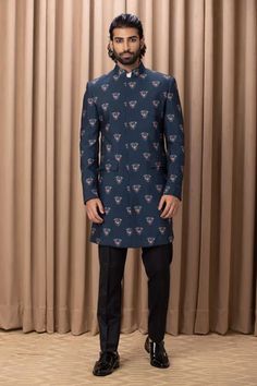 Navy jacket style kurta with floral digital printed hand painted pattern. Comes with Chinese collar shirt and black trouser.
Component: 3
Pattern: Digital Print
Type Of Work: Floral Patterns
Neckline: Mandarin Collar
Sleeve Type: Straight Long
Fabric: Cotton and Silk, Lining: Cotton
Color: Blue
Other Details: 
Concealed button placket kurta
Occasion: Sangeet - Aza Fashions Chinese Collar Shirt, Floral Print Jacket, Chinese Collar, Printed Jacket, Couture Outfits, Mens Luxury Fashion, Navy Jacket, Indo Western, Print Jacket