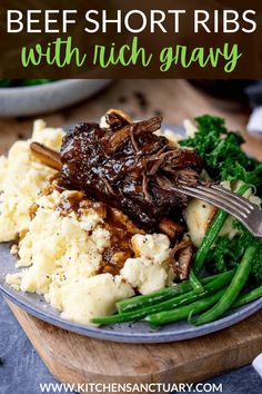 beef short ribs with irish gravy served on mashed potatoes and broccoli