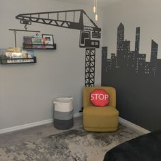 a room with a construction themed wall mural