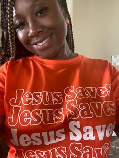 Jesus Saves Tee shirt Casual Orange Shirt With Screen Print, Casual Orange Shirt With Letter Print, Casual Orange Pre-shrunk Shirt, Orange Short Sleeve Top With Slogan, Casual Orange Screen Print Shirt, Orange Graphic Tee With Letter Print, Orange Letter Print Graphic Tee, Orange Short Sleeve Shirt With Text Print, Orange Pre-shrunk Graphic Tee Shirt