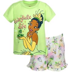 Your little Disney fan is ready for a magical day in these cute sets featuring her favorite fairy tale princesses. These stylish short sleeve tee and shorts sets feature artwork of characters like Cinderella, Moana, Pocahontas, Snow White, Jasmine from Aladdin, Ariel from The Little Mermaid, Belle from Beauty and the Best, Tiana from The Princess and the Frog, Rapunzel from Tangled, Raya from Raya and the Last Dragon, and Elsa from Frozen. Made of a soft material that keeps your little girl comf Terry Shorts Outfit, Princesa Tiana, Disney Princess Outfits, Disney Princess Tiana, Disney Princess Cinderella, Princess Tiana, French Terry Shorts, Shorts Outfit, Princess Outfits