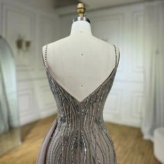 a dress on a mannequin in a room