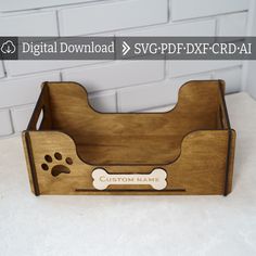 a wooden box with a dog's paw print on the front and bottom side