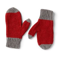 two red and gray mittens sitting on top of each other