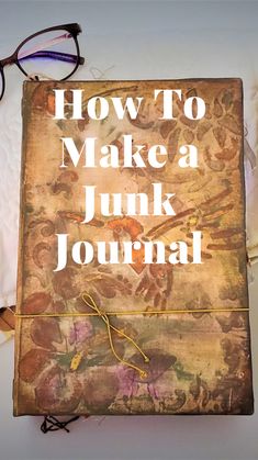 an old book with the words how to make a junk journal written on it next to eyeglasses