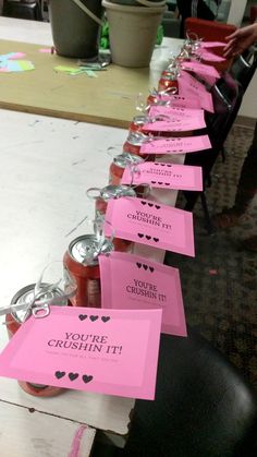 a row of pink cards that say you're crushin'it and have hearts on them