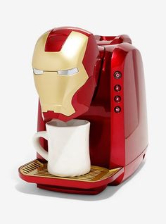 an iron man coffee maker with a cup in it