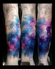 the legs are covered with colorful tattoos on them, and there is no image to describe