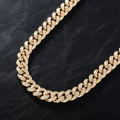 The 14mm Iced Miami Cuban Chain provides a more subtle approach to the bigger, iced chain. The Miami Cuban Chain features a rounder, thicker style and is available in 14K Gold and white gold. features iced out the clasp and are handcrafted to perfection. Material Sterling silver/Copper/Silver Finish 18K Gold Plated Stone type Flawless VVS Simulated Diamonds Length 18" 20" 22" Width 14mm Package Content A Chain, A Gift box, Iced Chain, Customizable Jewelry, Diamond Ice, Miami Cuban, Diamond Chain, Colored Gems, Cuban Chain, Everyday Jewelry, Personalized Necklace