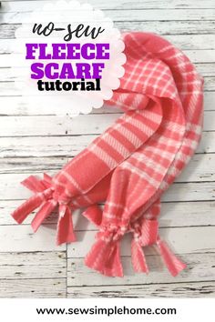 a red and white checkered scarf with the words no sew fleeie scarf