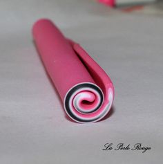 two pink rollers laying on top of each other