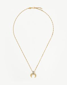 Lucy Williams Pavé Horn Pendant Necklace | 18ct Gold Plated Vermeil/Cubic Zirconia. A Classic, Reimagined. Inspired by Our Original Lucy Williams X Missoma Trendsetting Design, the Large Horn Pendant Features Cubic Zirconia Snow Pavé for a Fine-Style Jewelry Finish, Paired with a Mini Figaro Chain. Style with a Classic Choker for a Layered Look. Metal: 18Ct Recycled Gold Plated Vermeil on Recycled Sterling Silver Pendant Dimensions: 16. 6mm X 17mm Length: 500mm Gemstone: Cubic Zirconia Weight: 7 Luxury Tarnish Resistant Cubic Zirconia Necklaces, Luxury Tarnish-resistant Cubic Zirconia Necklace, Luxury Tarnish Resistant Cubic Zirconia Necklace, Formal Tarnish-resistant Diamond Necklace, Refined Gold Round Diamond Necklace, Elegant Tarnish Resistant Diamond Necklace For Anniversary, Elegant Gold Necklaces With Pave Setting, Elegant Gold Necklace With Pave Setting, Gold Necklaces With Pave Setting For Everyday Luxury