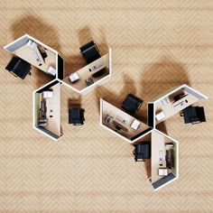 an overhead view of a living room and office space with furniture arranged in hexagonal shapes