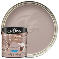 a paint can with a white background and the words crown on it, which is next to an image of a horse