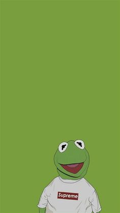 kermie the frog wearing a supreme t - shirt and standing in front of a green background