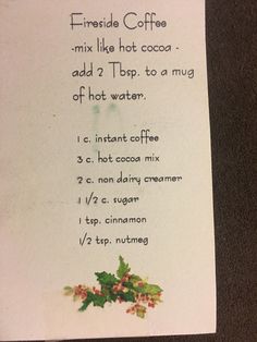 a recipe for hot cocoa is displayed on a table