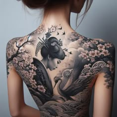 the back of a woman with tattoos on her body