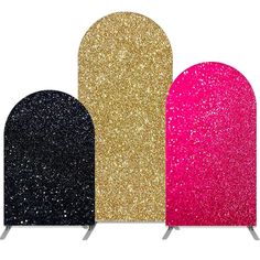 three different colors of glitter on top of each other, one black and one pink