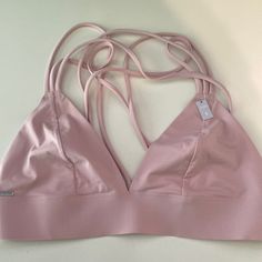 Vs Pink Unlined Sports Bra. Nwt. Seamless Triangle Top Activewear For Workout, Solid Sports Bra Triangle Top, Solid Color Triangle Sports Bra, Stretch Triangle Top Sports Bra For Spring, Sporty Sports Bra With Adjustable Straps For Loungewear, Sporty Stretch Triangle Bra, Athleisure Triangle Top Activewear For Gym, Triangle Top Activewear For Workout, Sporty Seamless Triangle Top Activewear