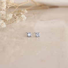 Square CZ Diamond Stud Earrings - This listing is for either the Square CZ Diamond Stud, available as a single (1 earring, for one ear) or a pair (2 earrings, one for each ear). Featuring a cubic stone. Perfect for a subtle sparkle worn alone or great layered with other pieces.- Base Material: High Quality Solid 925 Sterling Silver- Finish: 18K Gold or Rhodium- Measurement: 4mm- Nickel Free- All our jewelry is packaged in gift ready boxes. If you would like multiple items from your order package Diamond White Crystal Earrings For Pierced Ears, Diamond White Crystal Earrings For Fine Jewelry, Minimalist Cubic Zirconia Round Cut Earrings, Minimalist Round Cut Cubic Zirconia Earrings, Diamond Crystal Earrings With Sparkling Stones As A Gift, Silver Drop Earrings With Single Diamond, Gift Diamond Crystal Earrings With Sparkling Stones, Silver Earrings With Single Diamond For Gift, Sterling Silver Single Diamond Earrings Gift