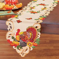 a table runner with a turkey on it