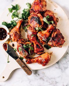 chicken wings with sauce and parsley on a plate