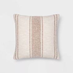 a beige and white striped pillow