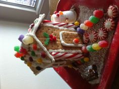 a gingerbread house with candy and candies on it