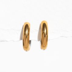 Switch up your look in our Duality Hoops! Boasting a unique and innovative gold and silver design, these earrings offer effortless versatility to match any outfit. With just a simple flip, you can switch up your look in an instant. Don't settle for just one metal color when you can have the best of both worlds.Our line of stainless steel hoops are made to be water and tarnish resistant. Wear this and feel confident wherever you go without having to worry about upkeep! Material: Stainless steel H Everyday Gold Tarnish-resistant Cartilage Earrings, Gold Minimalist Cartilage Earrings For Everyday, Everyday Minimalist Gold Cartilage Earrings, Gold Minimalist Metal Clip-on Earrings, Gold Minimalist Tarnish-resistant Cartilage Earrings, Gold Tarnish Resistant Clip-on Earrings For Everyday, Minimalist Metal Plug Earrings For Everyday, Gold Tarnish-resistant Clip-on Earrings For Everyday, Hypoallergenic Small Hoop Gold Plug Earrings