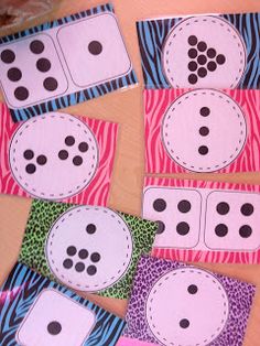 four different types of polka dot cards on a table with the words subitizing