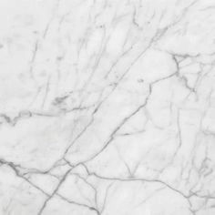 a white marble textured background with black lines