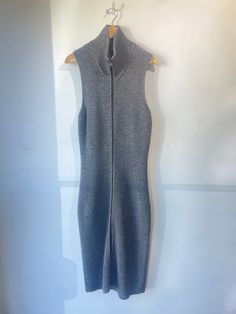 Maison Martin Margiela Grey Tweed Knit Bodycon Dress. Zipper runs up the entire front of the dress! Super sexy for a knit! Marked size 1, made in Italy. Fits many, stretchy. Dry clean only. 100% non-itchy wool. Approximate Measurements:Arm to arm: 18" Length: 47" Italy Fits, Knit Bodycon Dress, Grey Tweed, Knitted Bodycon Dress, Martin Margiela, Dress Zipper, Knit Midi, Knit Midi Dress, The Dress