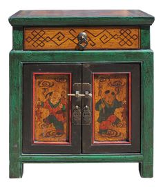 an ornate wooden cabinet with two doors