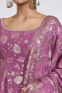 Purple three fourth sleeves kurti with all over gul sequin embroidery and dangling bead embellishments on the hem. Paired with an embroidered sharara and a sequin embroidered dupatta. - Aza Fashions Festive Long Sleeve Anarkali Set With Motifs, Wedding Palazzo Set With Straight Kurta And Motifs, Festive Wedding Palazzo Set With Motifs, Straight Kurta Wedding Dress With Motifs, Festive Palazzo Set With Motifs, Wedding Straight Kurta Dress With Motifs, Festive Sharara With Motifs And Straight Kurta, Long Sleeve Anarkali Set With Motifs For Diwali, Fitted Palazzo Set With Motifs For Festive Season