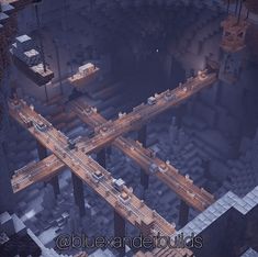 an aerial view of a bridge in minecraft