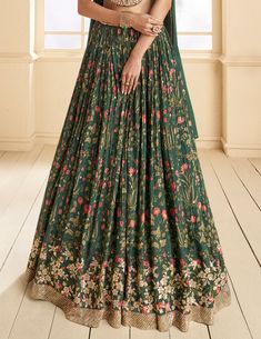 COLOR : Dark Green FABRIC : Top (Blouse) - Pure Georgette, Bottom (Lehenga) - Pure Georgette, Inner - Cancan, Dupatta - Chinon WORK : Thread Work, Beads, Stones, Sequins, Digital Print, Lace Border OCCASION : Wedding, Reception, Sangeet, Engagement READY-TO-WEAR : NoSTITCHING : Available as semi-stitched fabric, can be stitched using standard size option (+$30). Note: There might be a slight color variation due to lighting and flash used during photoshoot. The bright shade seen is the best close Green Wedding Lehenga, Dark Green Wedding, Dark Green Fabric, Wedding Lehenga, Lace Border, Thread Work, Green Wedding, Lehenga Choli, Green Fabric