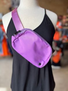 Carry your everyday essentials and more in style with this cool Sling Belt Bag! Perfect for festivals and sports, it comes with an adjustable strap so you can rock it slung 'cross your chest or hips - either way, you'll be lookin' fly! Trendy Purple Bags For Outdoor Activities, Casual Chest Bag With Adjustable Strap For Sports, Casual Sports Chest Bag With Adjustable Strap, Trendy Sports Shoulder Bag With Adjustable Strap, Sports Crossbody Chest Bag With Adjustable Strap, Sporty Crossbody Chest Bag With Adjustable Strap, Trendy Chest Bag With Cell Phone Pocket For Outdoor, Casual Purple Belt Bag For Travel, Trendy Belt Bag With Adjustable Strap For Outdoor Activities