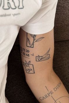 a person's arm with tattoos on it and the words carpe dien