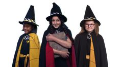 three people dressed up in wizard costumes