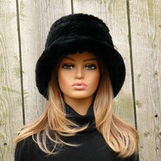 This black fur bucket hat is the perfect combination of warmth and fashion. Designed to keep you cozy during the colder months, its soft, plush fur provides insulation while adding a luxurious touch to your winter wardrobe. The wide brim adds a chic flair, making it a versatile accessory for any outfit. +  100% handmade.  + Highlights Made of Rex rabbit fur One Size Hat -  55 - 56 cm / 21.6 - 22" ( S )     57 - 58 cm /  22.4  - 22.8" ( M ) The basis of the hat - 45% wool, 45% acrylic, 10% Polyam Chic Luxury Women's Bucket Hat, Luxury Black Women's Bucket Hat, Fur Bucket Hat Black, Fluffy Purse, Rabbit Fur Hat, Fur Bucket, Fur Bucket Hat, Flapper Hat, Bucket Hat Women