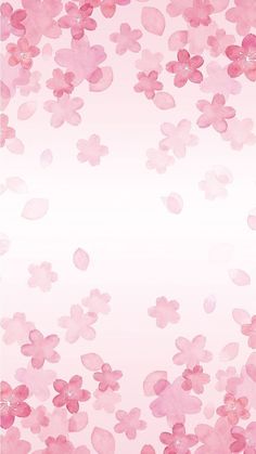 pink flowers are floating in the air